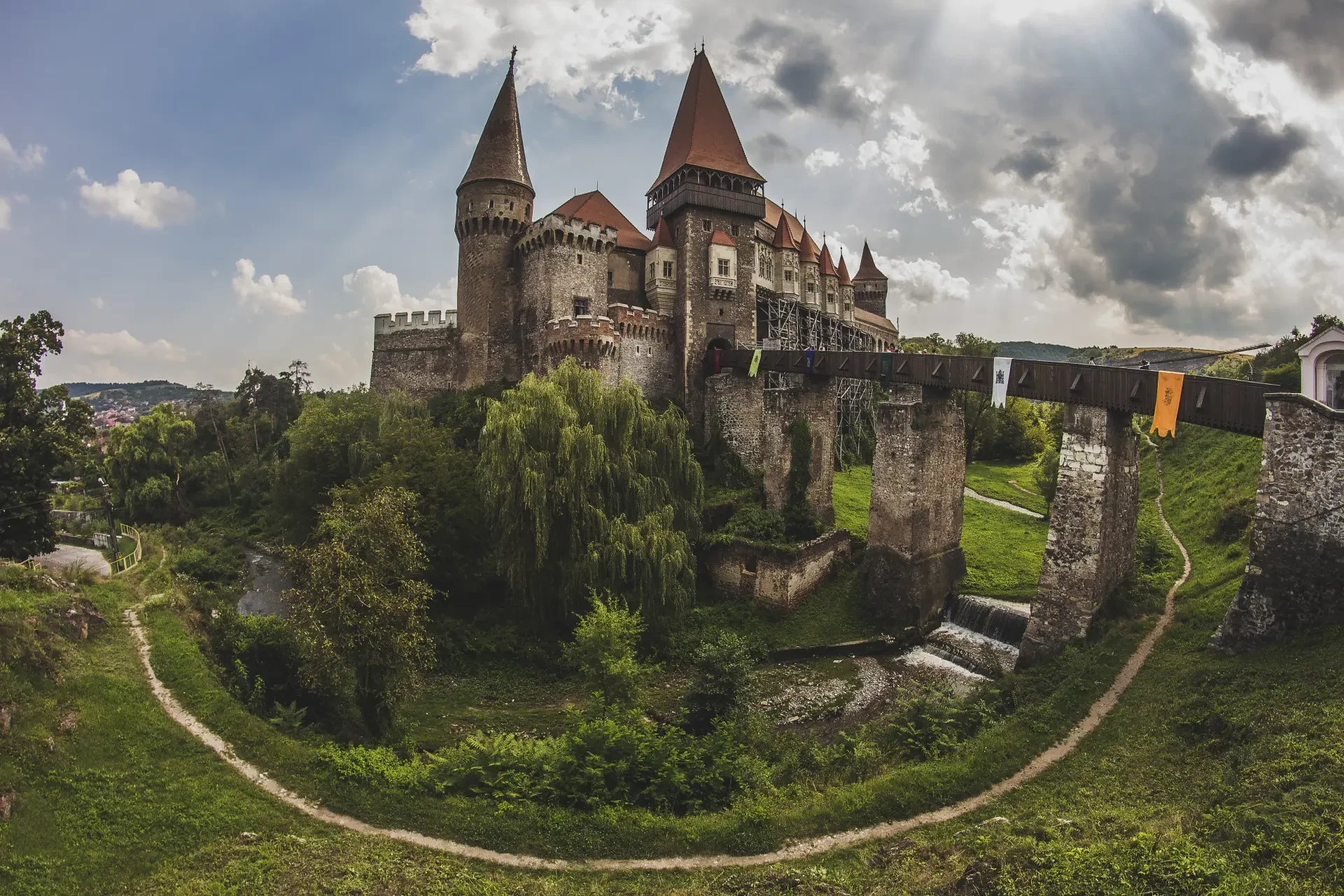 Corvin Castle Gothic towers stone bridge and fortified walls